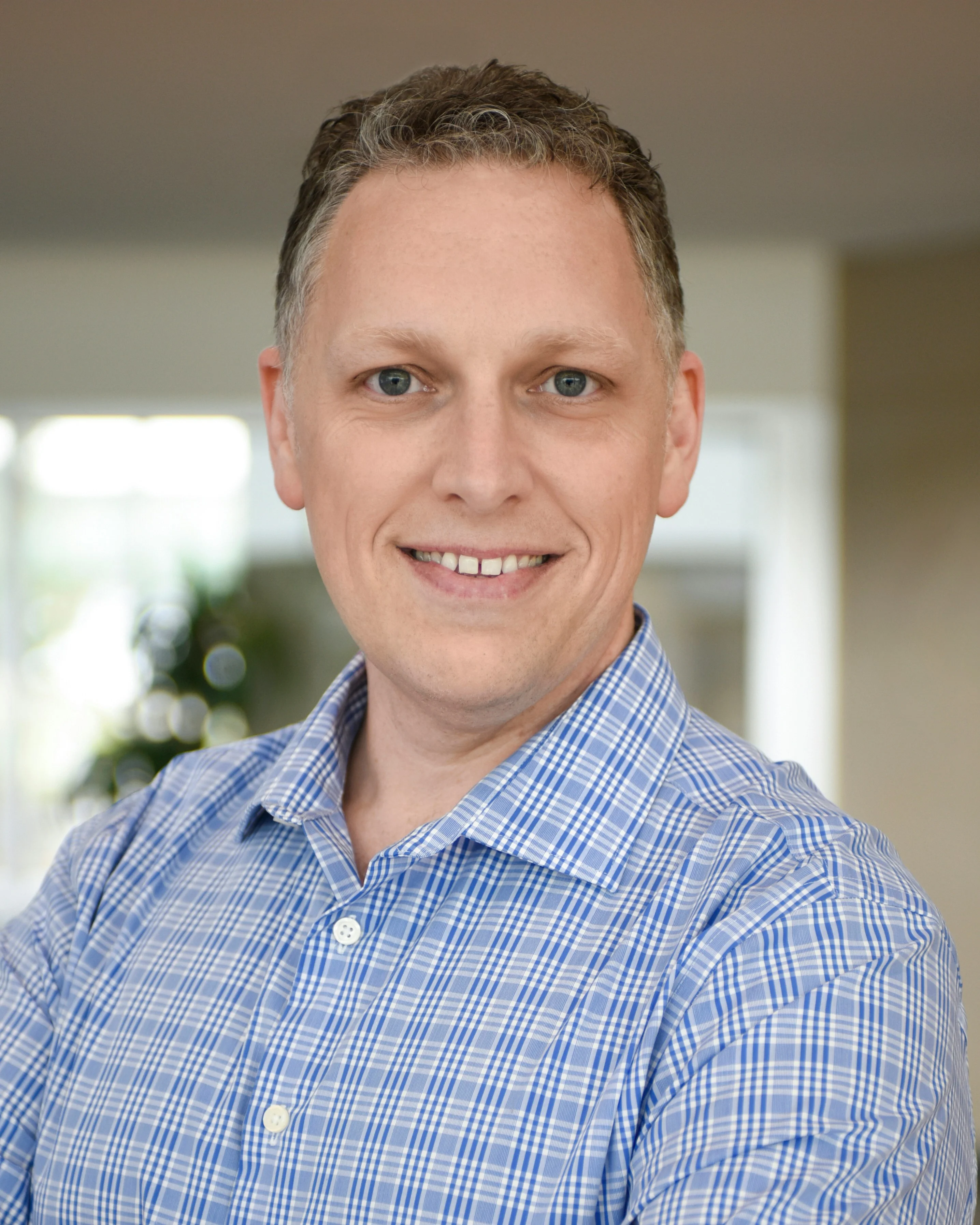 Headshot representing Michael Thompson, the buyer persona